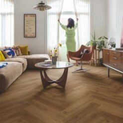 Quick-Step Alpha Vinyl Ciro Herringbone Botanic Caramel Oak AVHBU40364 Rigid Vinyl Flooring